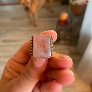 Expandable silver ring.